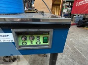 Foto van Omsnoeringsmachine