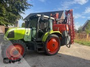 Foto van Claas- ARES 547 ATZ met Kubota spuit