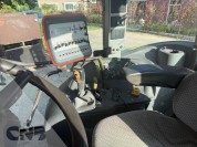 Foto van Claas- ARES 547 ATZ met Kubota spuit