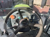 Foto van Claas- ARES 547 ATZ met Kubota spuit