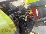 Foto van Claas- ARES 547 ATZ met Kubota spuit