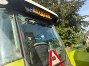 Foto van Claas- ARES 547 ATZ met Kubota spuit