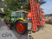 Foto van Claas- ARES 547 ATZ met Kubota spuit