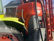 Foto van Claas- ARES 547 ATZ met Kubota spuit