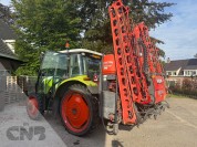 Foto van Claas- ARES 547 ATZ met Kubota spuit